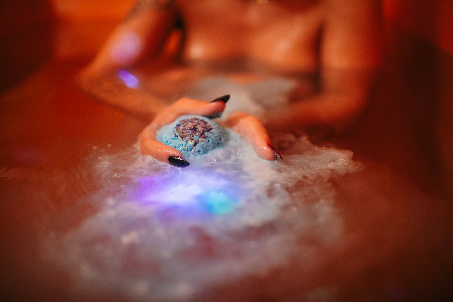 Lavender, peppermint, and cedarwood essential oils bath bomb for restful sleep.