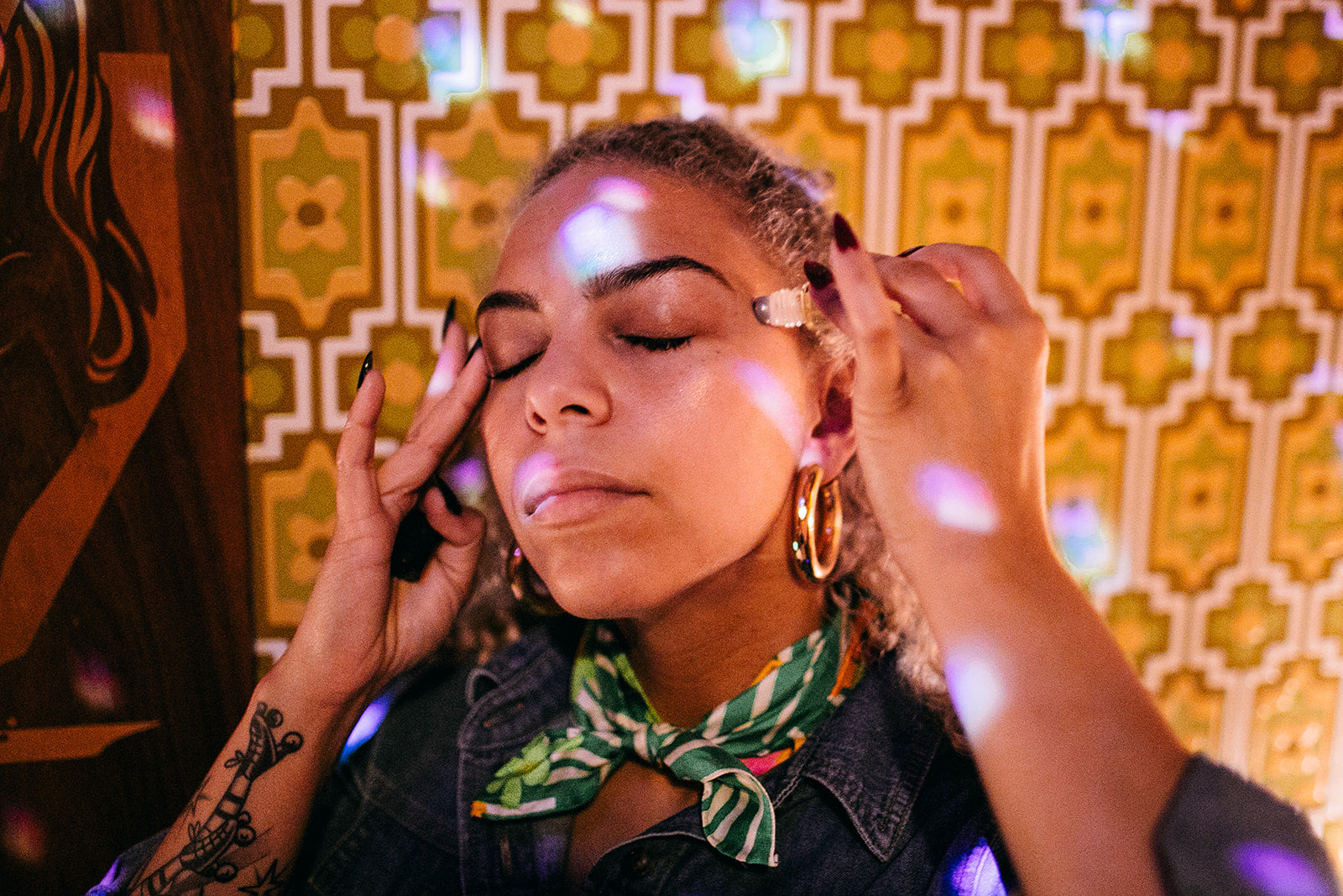 Wanderwood Headache Roller with essential oils like peppermint, eucalyptus, and cedarwood to relieve headaches, anxiety, and stress, and a Brazilian Clear Quartz crystal for added tranquility.