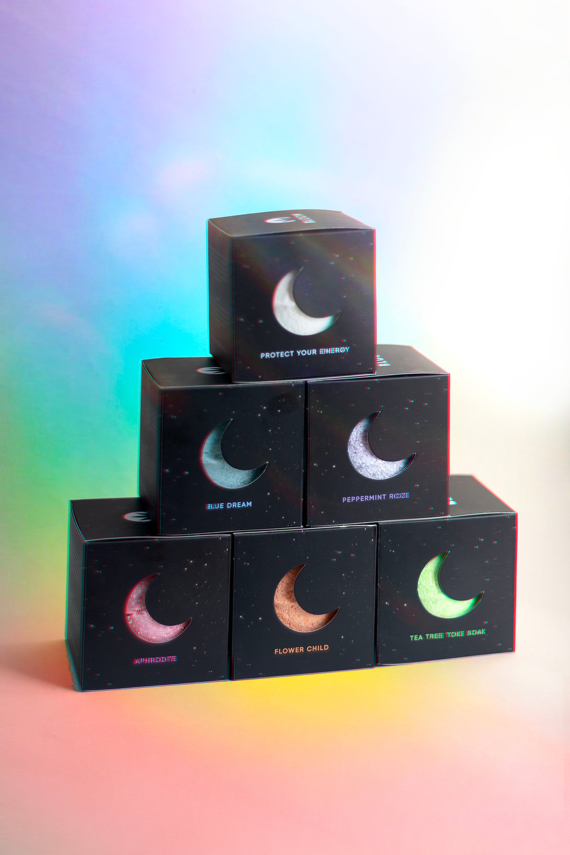 All six signature bath bombs in the Moonbow Bath Bomb Bundle offering soothing scents and nourishing ingredients for ultimate relaxation and skin benefits.
