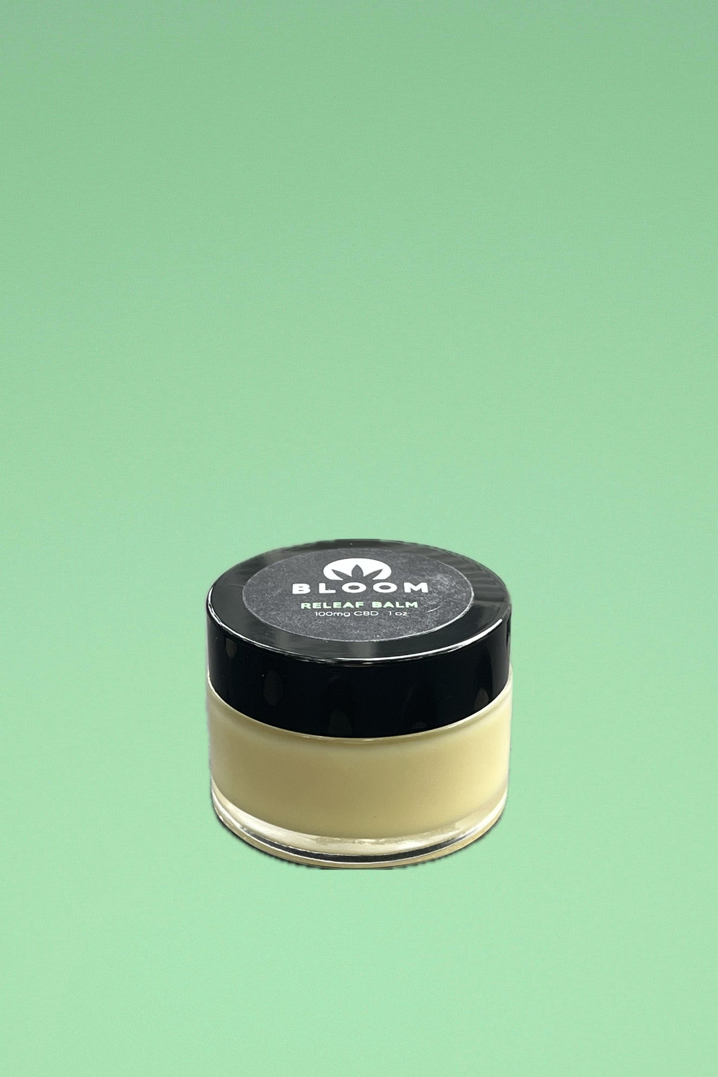 Releaf Balm with peppermint, eucalyptus, and camphor essential oils for extra strength pain relief from headaches, muscle soreness, and menstrual cramps.