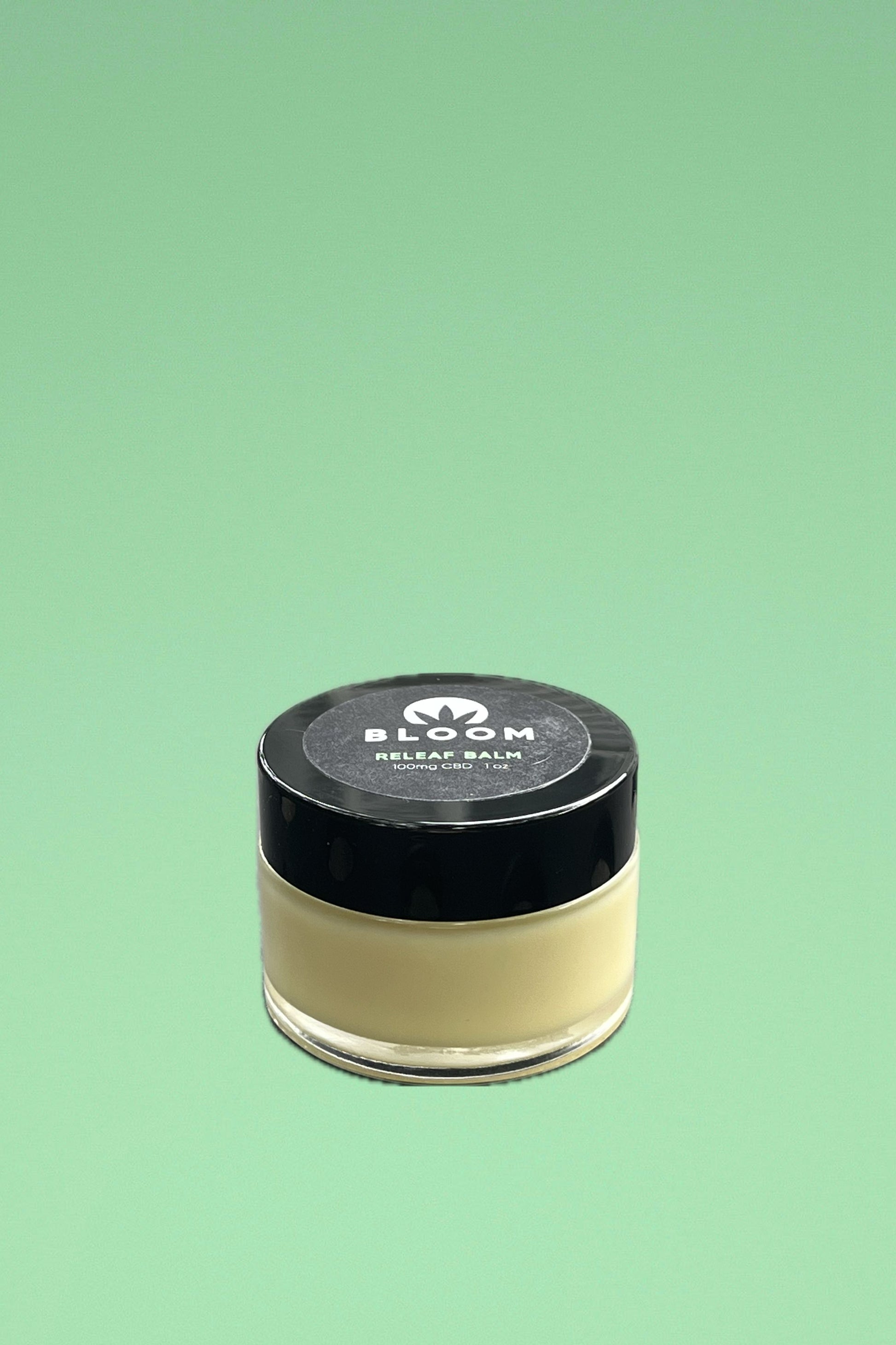 Releaf Balm with peppermint, eucalyptus, and camphor essential oils for extra strength pain relief from headaches, muscle soreness, and menstrual cramps.