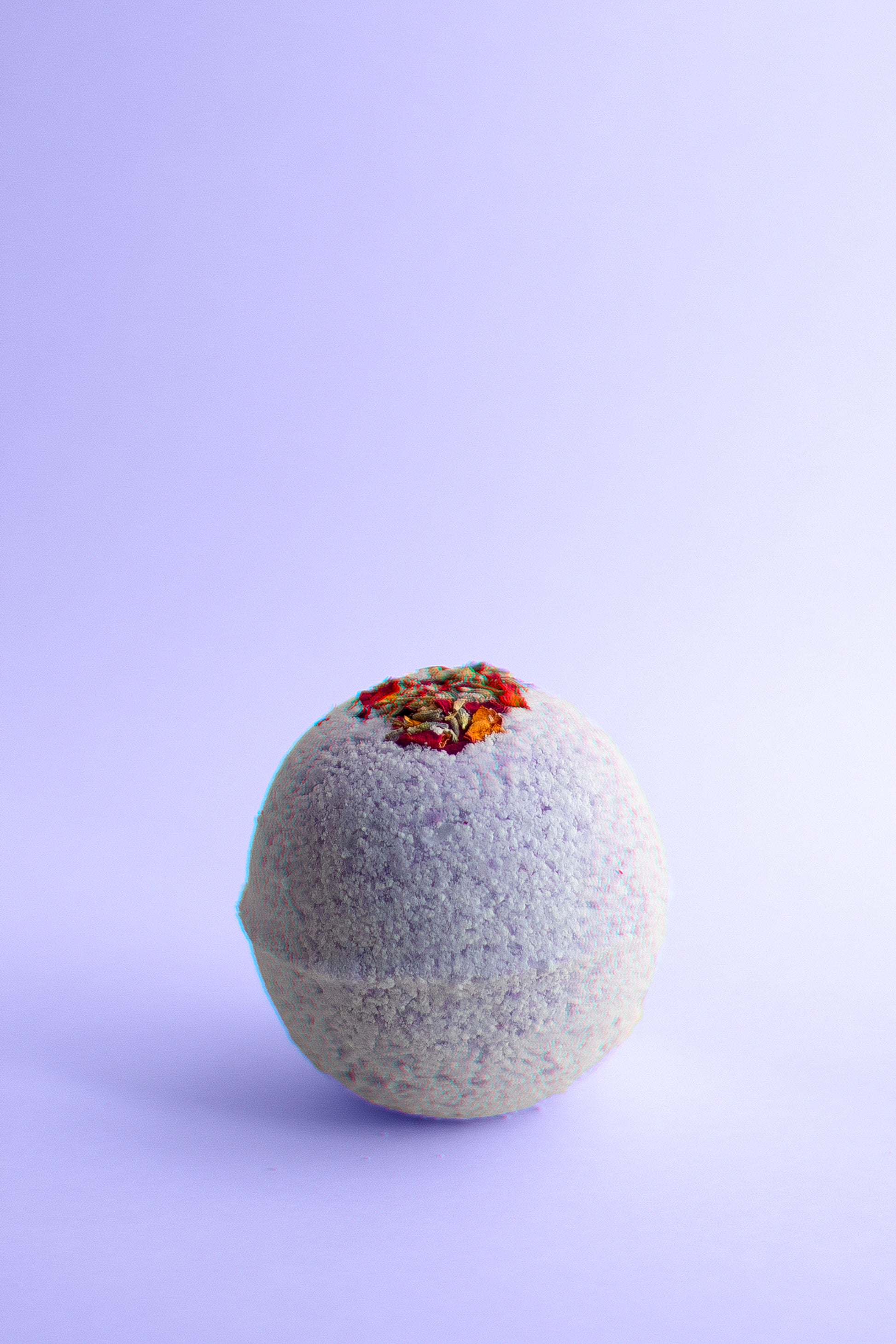 Muscle relief bath bomb with peppermint, camphor, and rose essential oils.